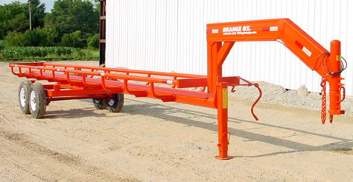 Orange Ox - Orange Ox Self Un-loading Hay Trailers - Ready to save you time and money. Call today for the best trailer at the best price!
