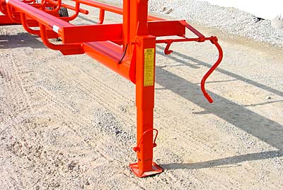 Orange Ox - Orange Ox Self Un-loading Hay Trailers - This pictures shows our 12,000 lb., spring loaded retractable jack