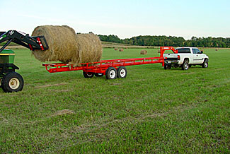 Orange Ox - Orange Ox Self Un-loading Hay Trailers - Loading