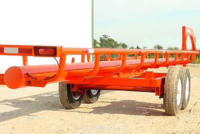 Orange Ox - Orange Ox Self Un-loading Hay Trailers - Notice the five foot wide main frame, constructed of 3 X 5 X  box tubing. A bigger, stronger frame.